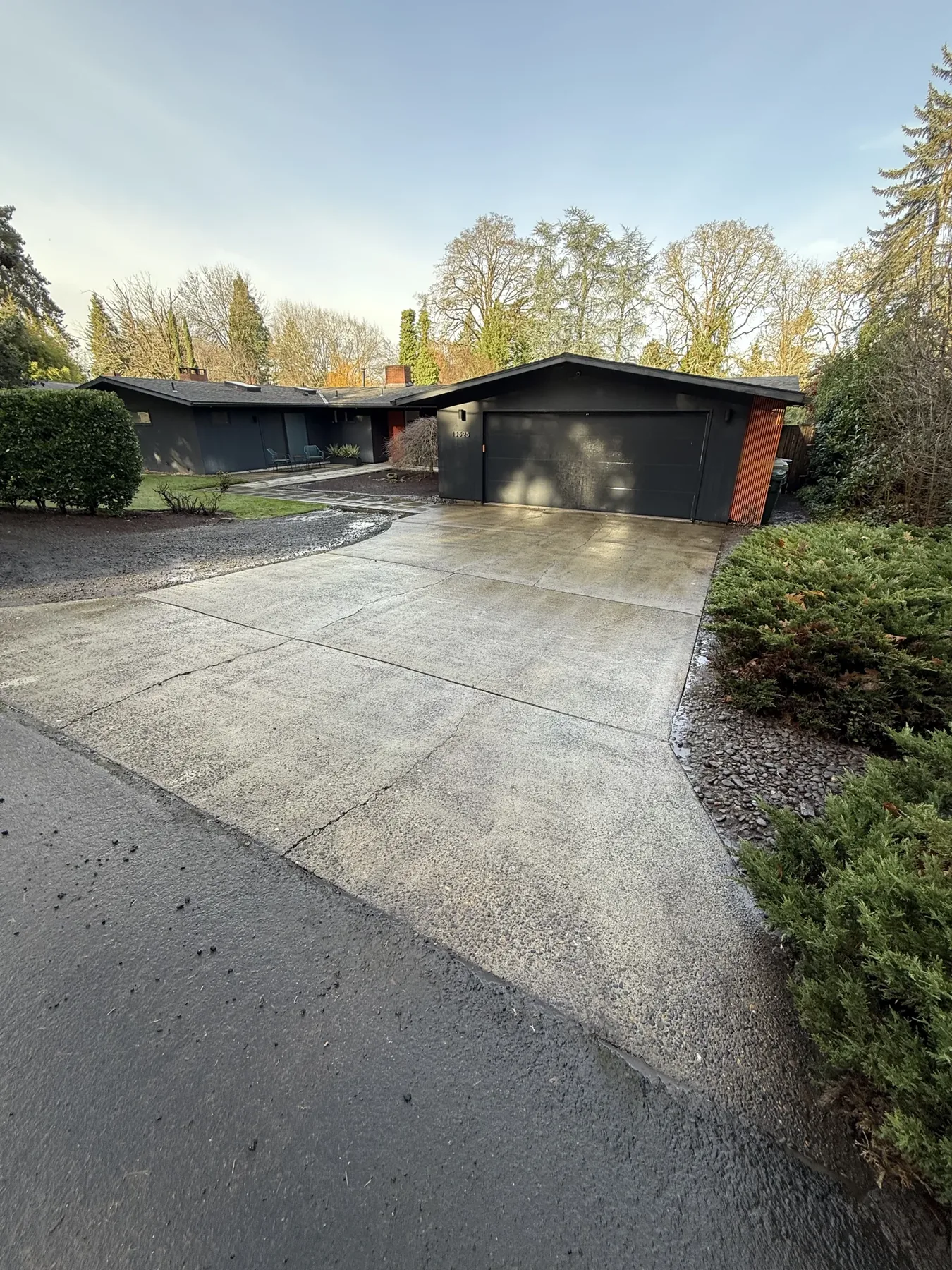 Cleaned driveway and detached garage approach after a Cedar Mill pressure washing project