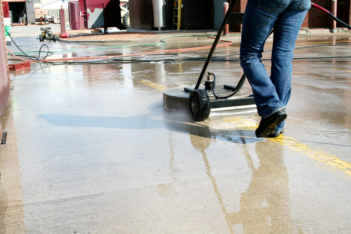 surface cleaner washing a commercial concrete walkway in Beaverton Oregon