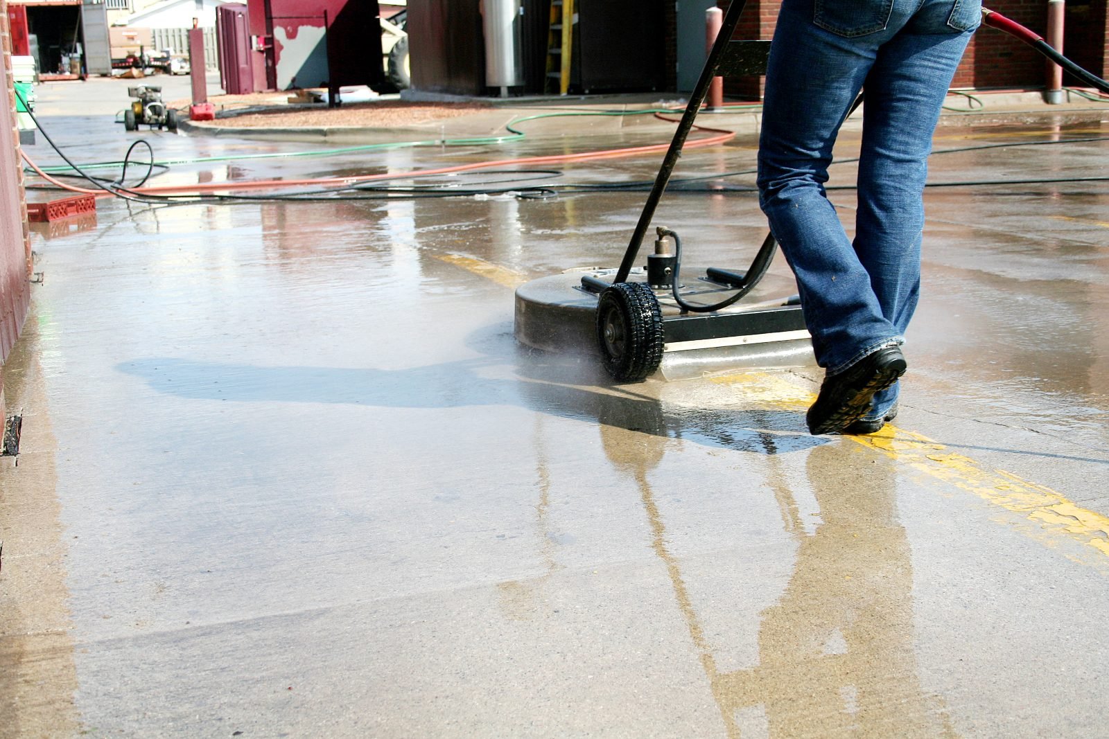 commercial pressure washing a concrete walkway in Oregon