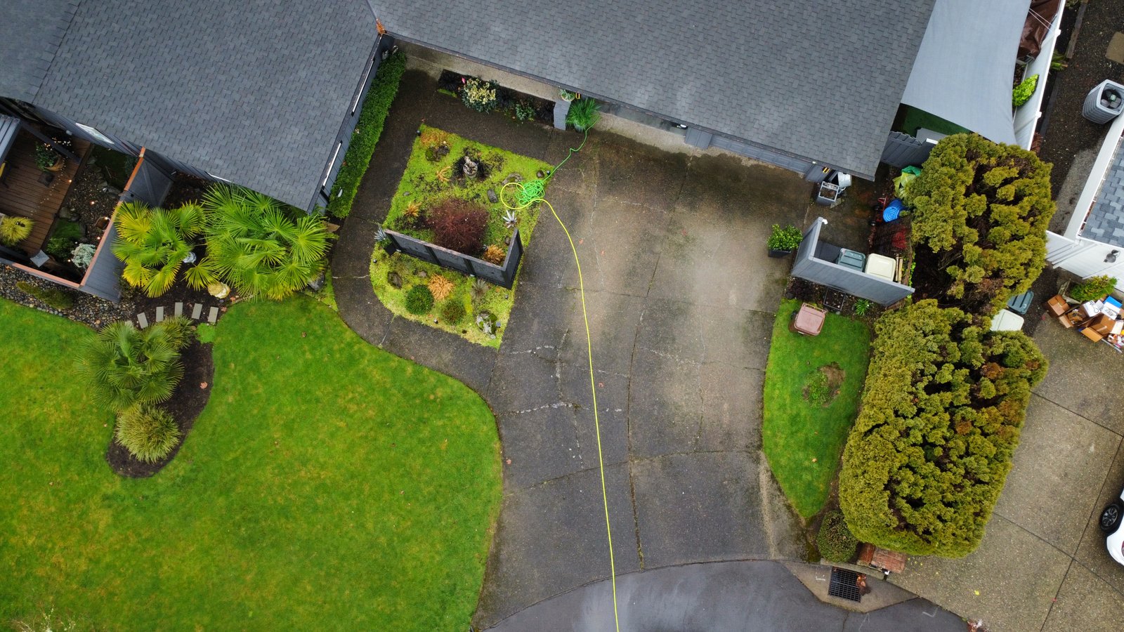 Residential driveway in Oregon with concrete areas that may need routine cleaning and surface washing