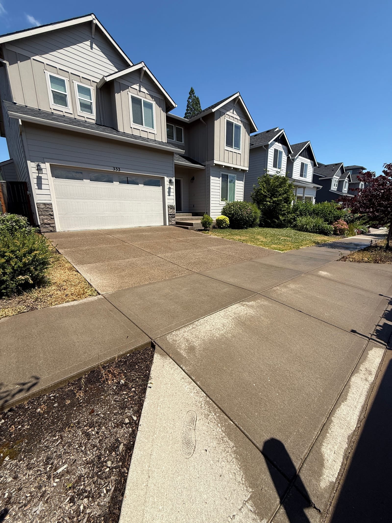 Driveway after concrete cleaning for curb appeal