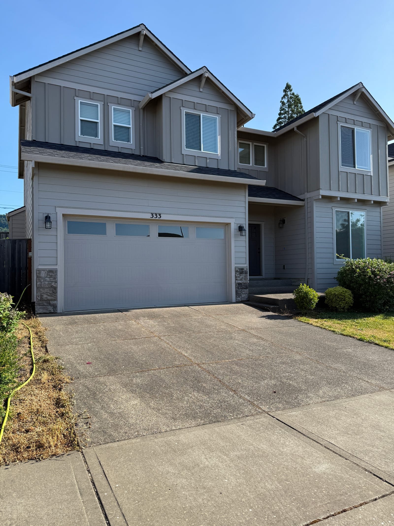 Driveway before concrete cleaning for curb appeal