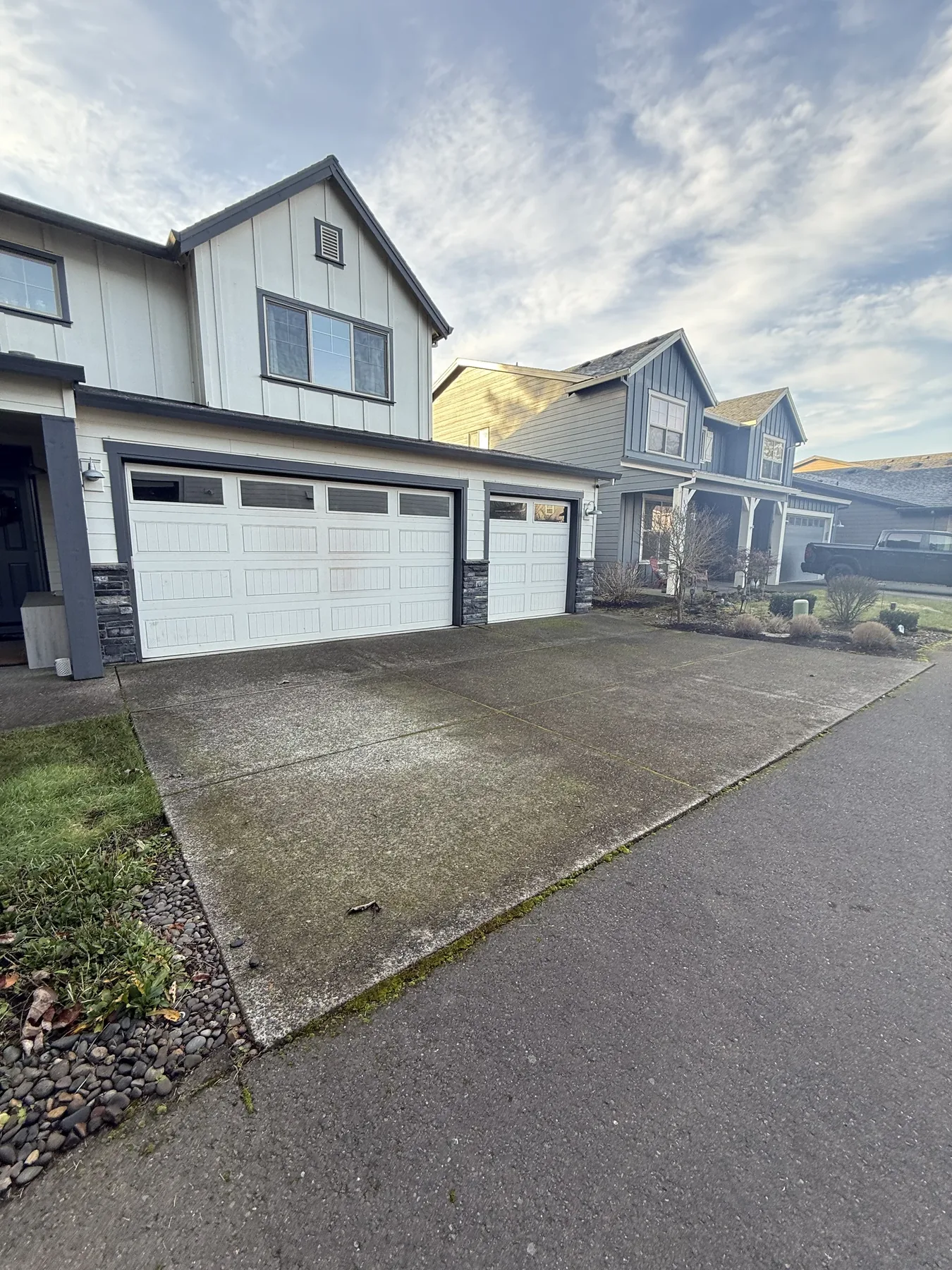 Forest Grove driveway and garage apron before pressure washing