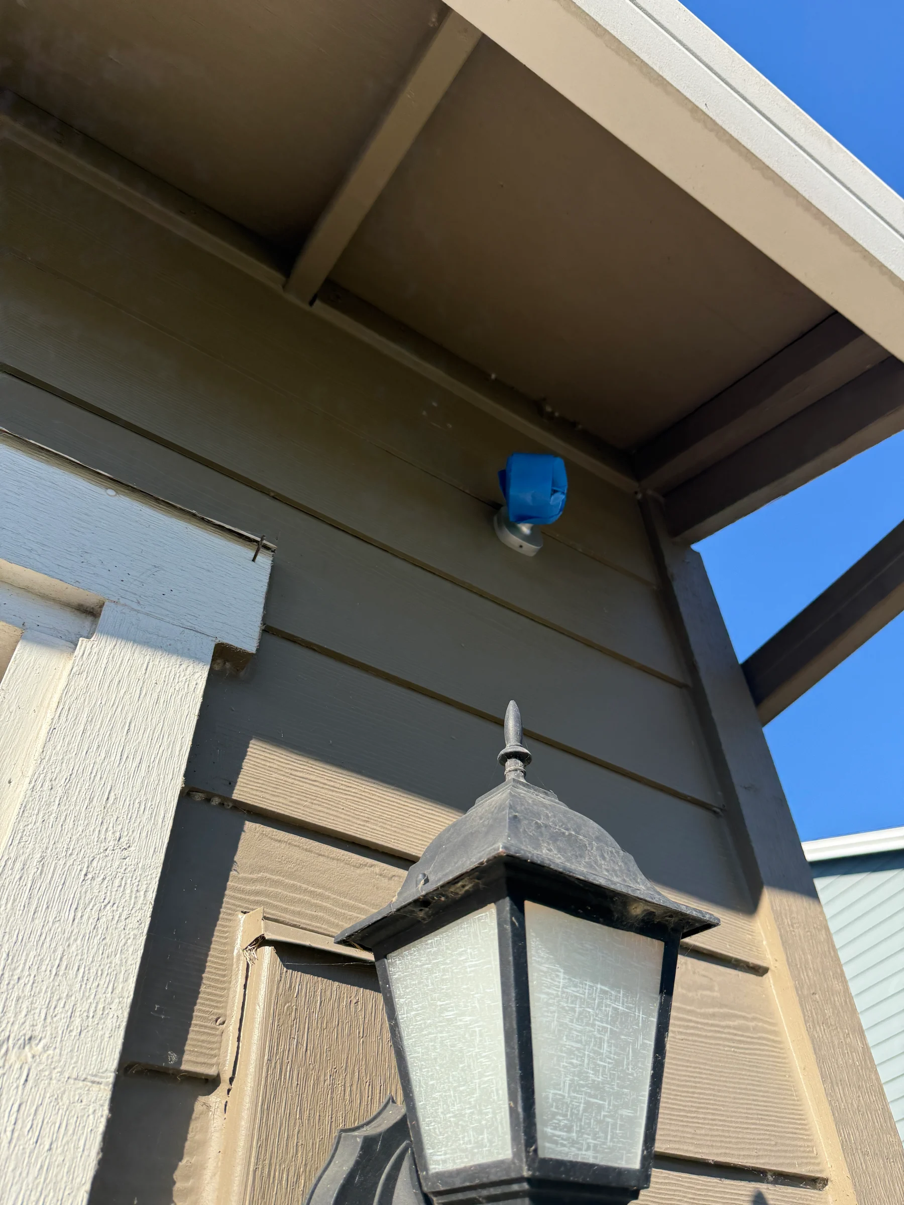 Covered exterior fixture during Forest Grove house washing preparation