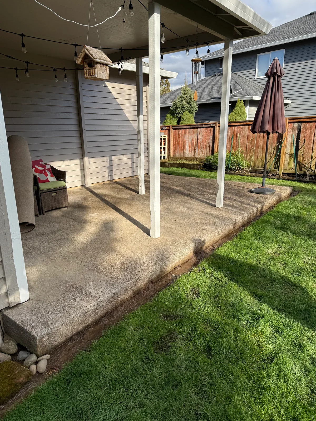Back patio after pressure washing at a Hillsboro HOA home