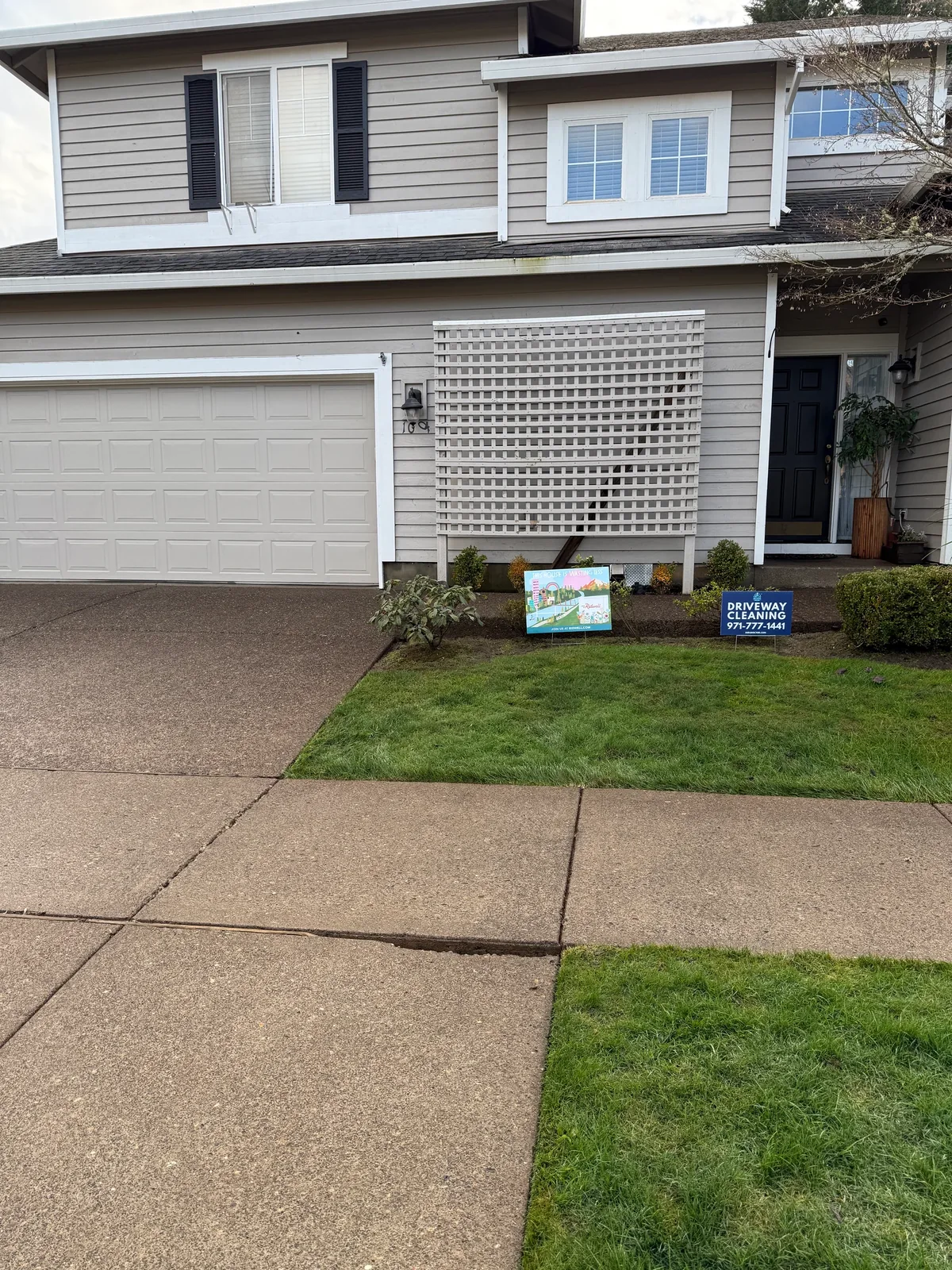 Front driveway and walkway after pressure washing at a Hillsboro HOA home