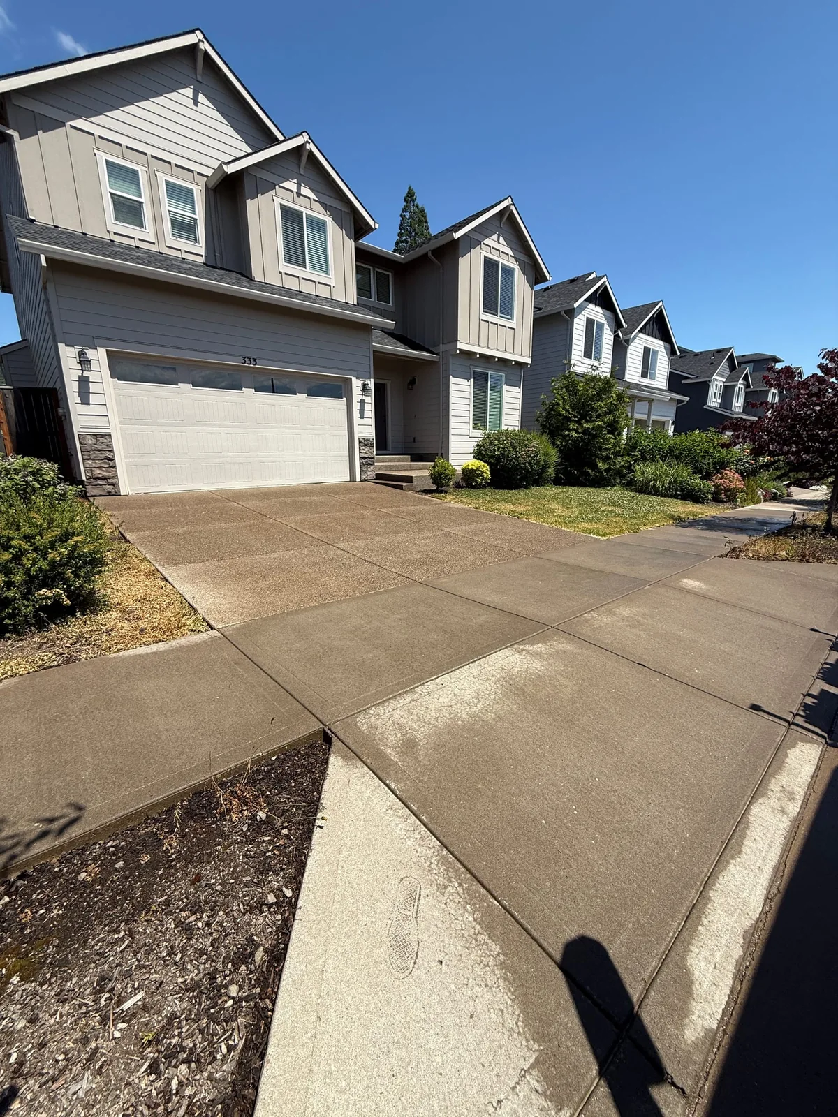 Driveway after concrete cleaning for curb appeal