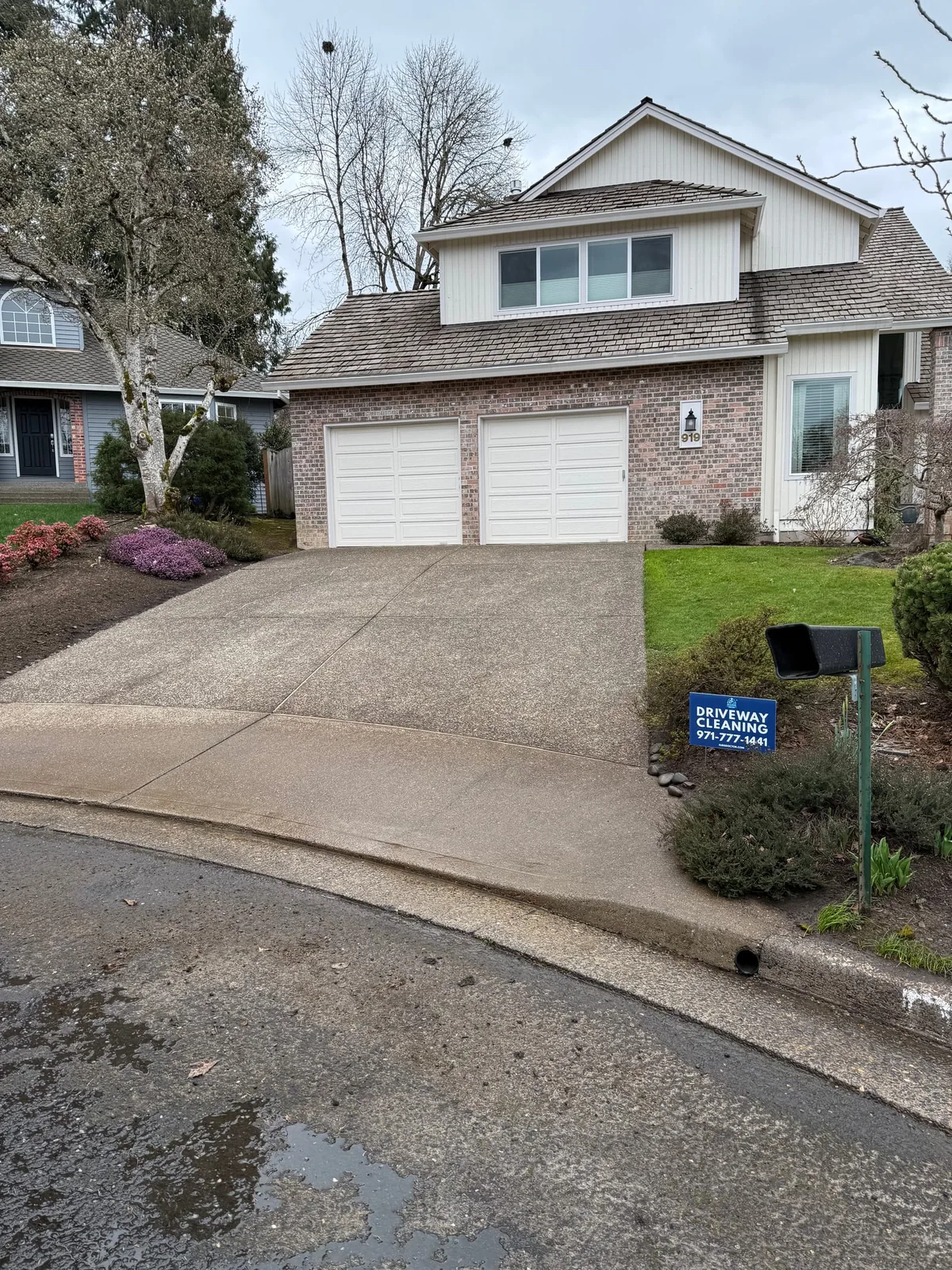 Finished driveway cleaning project before sale