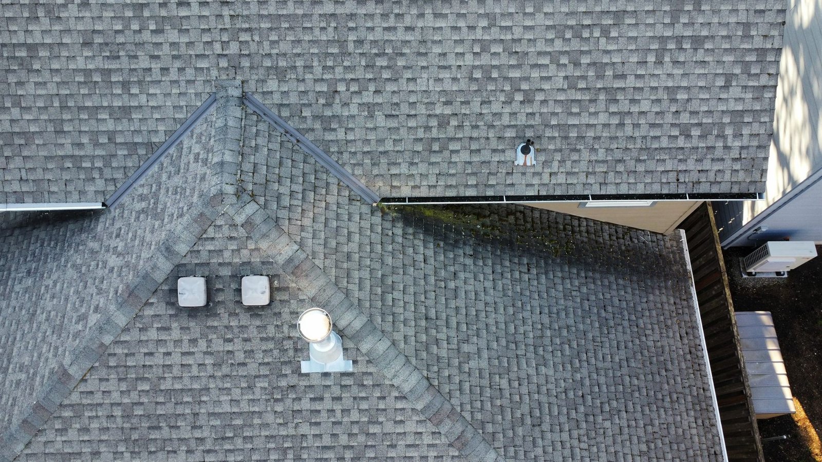 Aerial roof photo showing shaded sections where moss levels can determine whether roof treatment or full roof cleaning is needed