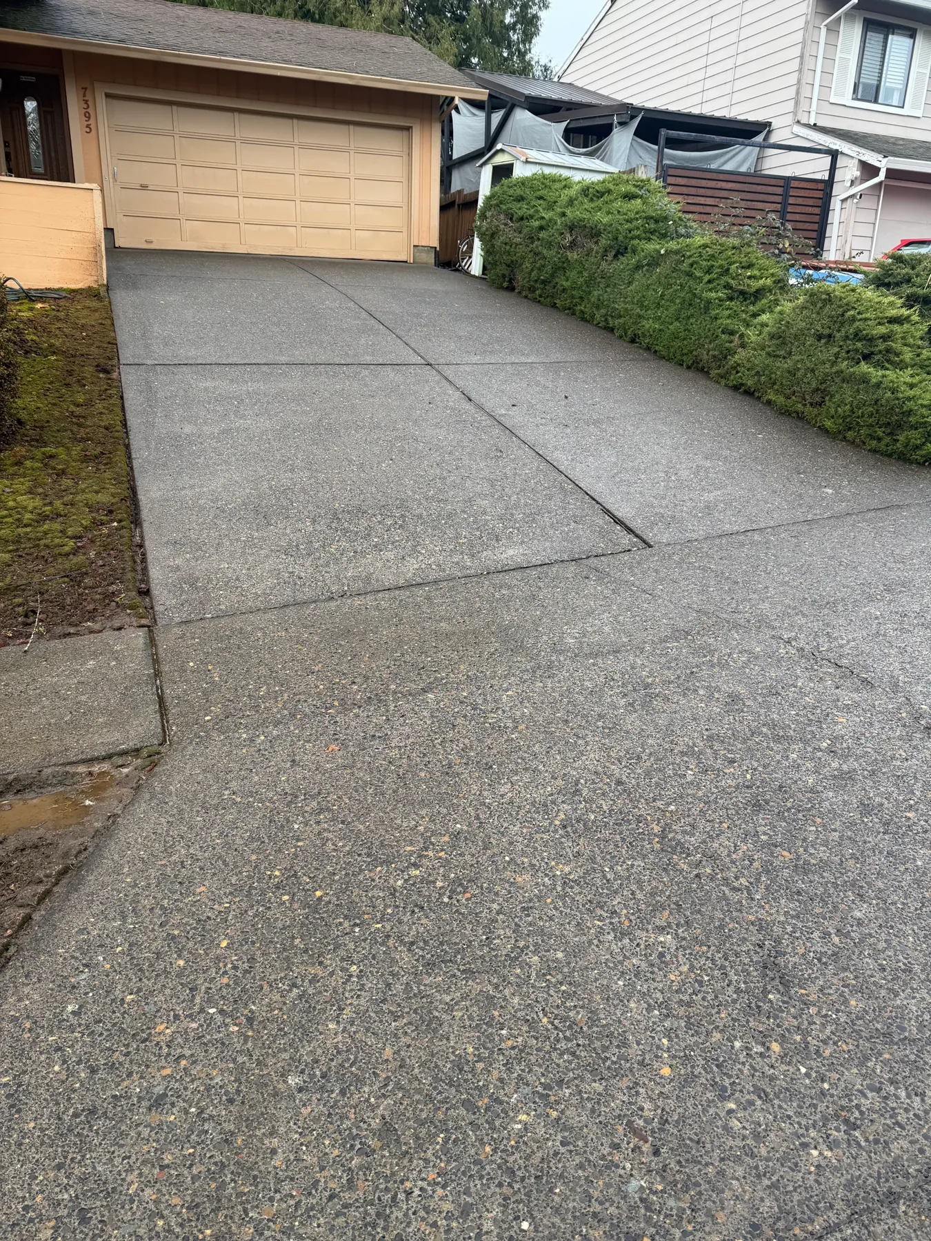 South Beaverton exposed aggregate driveway after cleaning with brighter concrete near garage
