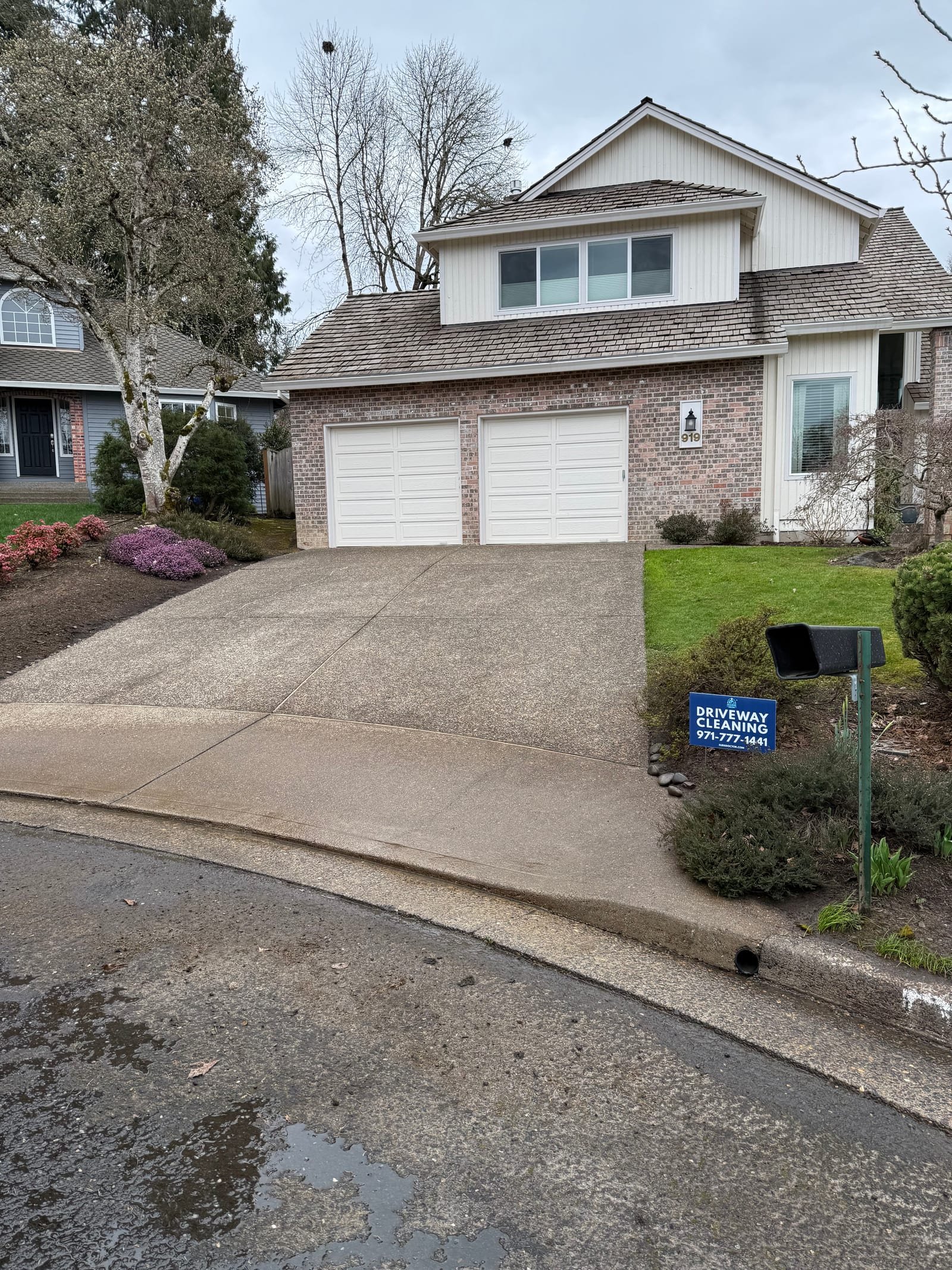 Finished driveway cleaning project before sale